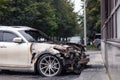 Kemerovo 2019-09-16 Wheel of white abandoned, stolen city car Infiniti FX50S burned out, suddenly started engulfing all Royalty Free Stock Photo