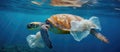 Kemps ridley sea turtle trapped underwater by plastic bag in azure ocean Royalty Free Stock Photo
