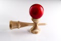Kendama japanese wooden toy on isolated on white. Wood toy with red bal.