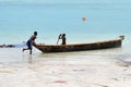 Two local boys on Kendwa coastline, Zanzibar, Tanzania, Africa Royalty Free Stock Photo