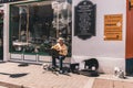 Kenmare, Ireland - small town in the south of County Kerry, Ireland: man busking in the streets