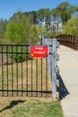 Park closed sign at Cobb County park during mandatory stay at home shelter in place order passed for Covid-19 Corona Virus Royalty Free Stock Photo