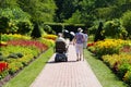 Kenneth Square, Pennsylvania, U.S - July 15, 2022 - An old couple enjoying themselves inside a garden