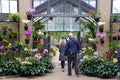 Kenneth Square, Pennsylvania, U.S - November 13, 2020 - Crowds wearing mask visiting an orchid garden