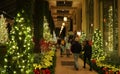 Kenneth Square, Pennsylvania, U.S.A - November 20, 2020 - Visitors wearing mask enjoying the garden with Christmas decorations