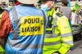 KENNINGTON, LONDON/ENGLAND - 5 September 2020: Extinction Rebellion Police Liaison speaking to a police officer