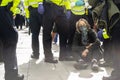 KENNINGTON, LONDON/ENGLAND - 5 September 2020: Extinction Rebellion protester sitting on the floor after being arrested