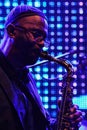 Kenny Garrett plays alto saxophone in front of large LED screen on stage during summer jazz festival OpenJazzFest Zelena Voda, Slo