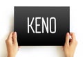 Keno is a lottery-like gambling game often played at modern casinos, text concept on card