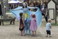 A colorful beautiful girl dressed as a fairy at the annual Bristol Renaissance Faire Royalty Free Stock Photo