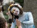 A colorful beautiful girl dressed as a fairy at the annual Bristol Renaissance Faire Royalty Free Stock Photo