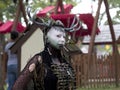 A colorful girl dressed in horrific costume as a forest deer at the annual Bristol Renaissance Faire