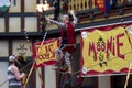 A jongleur performs with fire walking on a rope at the annual Bristol Renaissance Faire