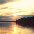 Kenozero lake at sunset. Aged photo. Nussian north Royalty Free Stock Photo