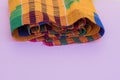 Kente cloth isolated against colorful background