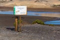 Kentish plover bird reservation sign on the coast under Montana Roja mountain, El Medano, Tenerife, Canary Islands, Spain