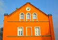 KENTShIN, POLAND. Orange facade of a house