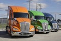 Kenworth Semi Tractor Trailer Big Rig Trucks display at a dealership. Kenworth is owned by PACCAR