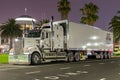 A Kenworth truck parked at the Cruise Terminal in Melbourne at night.