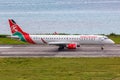 Kenya Airways Embraer 190 airplane Mahe Seychelles airport