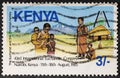 Kenya - circa 1985: A Kenyan postage stamp depicts an Afro-Christian family. Series 43 Eucharistic Congress, Nairobi, 11