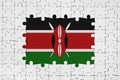 Kenya flag in frame of white puzzle pieces with missing central part Royalty Free Stock Photo