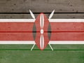 Kenya flag painted on wood plank background. Wooden texture flag of Kenya