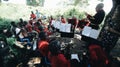 KENYA, KISUMU - MAY 20, 2017: Concert of an African band with a Caucasian dryer in the open air in sunny day.