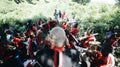 KENYA, KISUMU - MAY 20, 2017: Concert of an African band with a Caucasian dryer in the open air in sunny day.