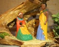 Kenya nativity scene with wooden statues with colored African ro Royalty Free Stock Photo