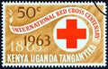 KENYA UGANDA TANGANYIKA - CIRCA 1963: A stamp printed in Kenya Uganda Tanganyika shows Red Cross emblem, circa 1963.
