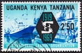 KENYA UGANDA TANZANIA - CIRCA 1969: A stamp printed in Kenya Uganda Tanzania shows Shipping and ILO Emblem, circa 1969. Royalty Free Stock Photo