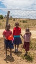 Kenyan school children at school fence