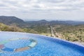 Swimming Pool Over Hilly Mountain Kenyan Highway Rural Roads Landscapes At Ol Talet Cottages off Magadi road Royalty Free Stock Photo