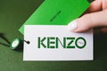 Kenzo logotype on green background.