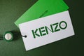 Kenzo logotype on green background.