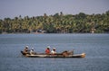 Kerala backwaters, local fishermen on their pirogues, from Kollam to Alleppey, Kerala, India