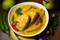 Kerala fish curry with raw mango coconut milk or Bengali Rohu or Barracuda Royalty Free Stock Photo