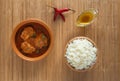 Kerala Fish Curry. Top view of spicy and hot king fish curry with green curry leaf Kerala India. Royalty Free Stock Photo