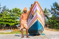 Kerala fisherman and his boat