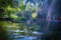Kerala, India - March 11, 2014: A fisherman sitting on his boat in the backwaters of Allepey located in state Kerala Royalty Free Stock Photo