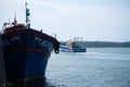 Indian blue fishing ships on the sea