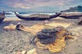 Kerala, India, November 30, 2017: Unidentified Indian Fishermans preparing fishing net for the fishing trip on the beach.