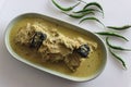 Kerala style, coconut based Pomfret fish curry. Yellow coloured fish curry Royalty Free Stock Photo