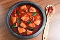 Kerala red fish curry in clay pot, Indian fish curry Royalty Free Stock Photo