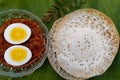 Appam with egg masala curry