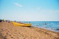 Kerch Crimea 07 18 2023 - Summer, city beach, rescue yellow boat with the inscription lifeguard