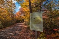 Hamilton Point Carriage Road info sign at Minnewaska State Park Preserve in Kerhonkson NY with brilliant fall foliage