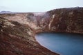 Kerid Kerith is a famous turquoise lake located in a volcanic creater and surrounded by magnificent hills of crimson red sand.