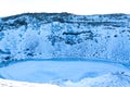 Kerid lake frozen in winter in the crater of an extinct volcano. Incredible iceland landscape in winter Royalty Free Stock Photo